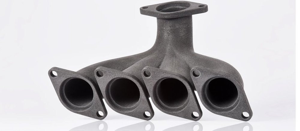 Manifold-3D-printed-using-SLS-from-PEKK-powder-with-23-carbon-fibers-on-the-EOS-P-810-1.jpg